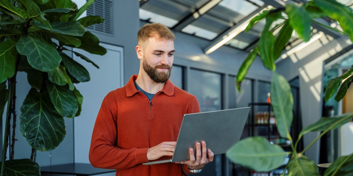 man looking at laptop